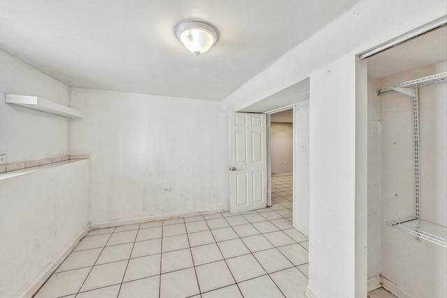 interior space with light tile patterned floors