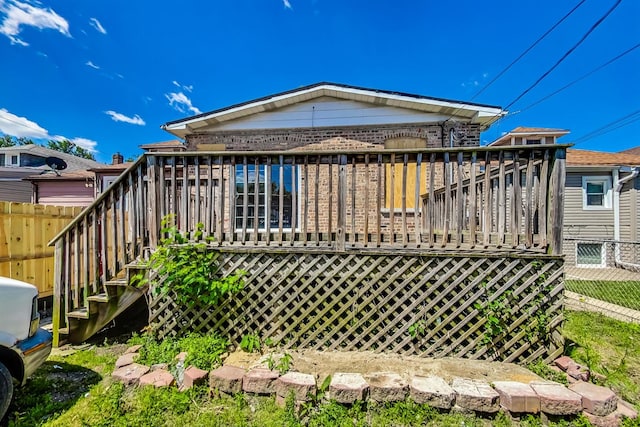 rear view of house with a deck