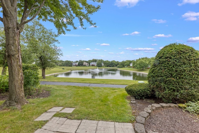 view of yard with a water view