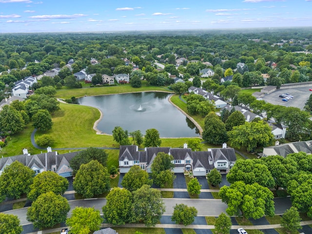 aerial view with a residential view and a water view