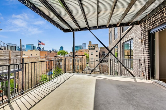 view of patio with a balcony