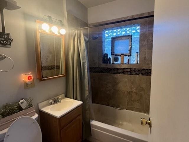 bathroom with shower / bath combination with curtain and vanity