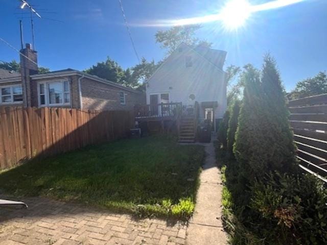 view of yard featuring a wooden deck