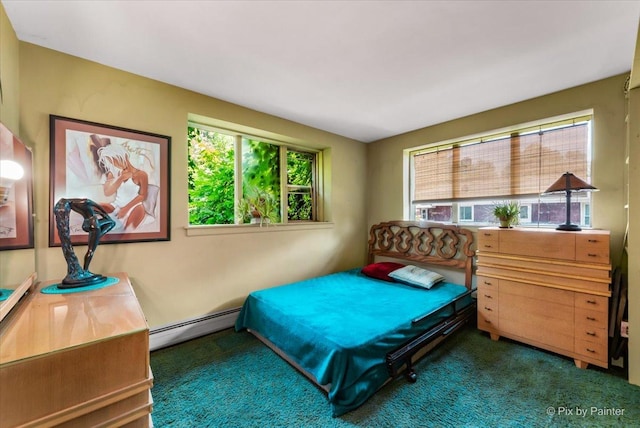 bedroom featuring carpet floors and a baseboard radiator