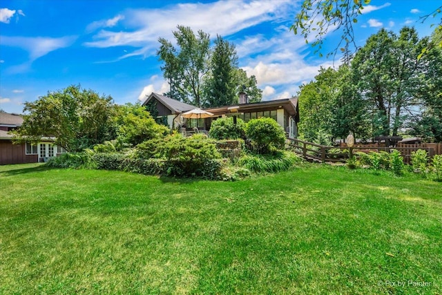 view of yard with fence