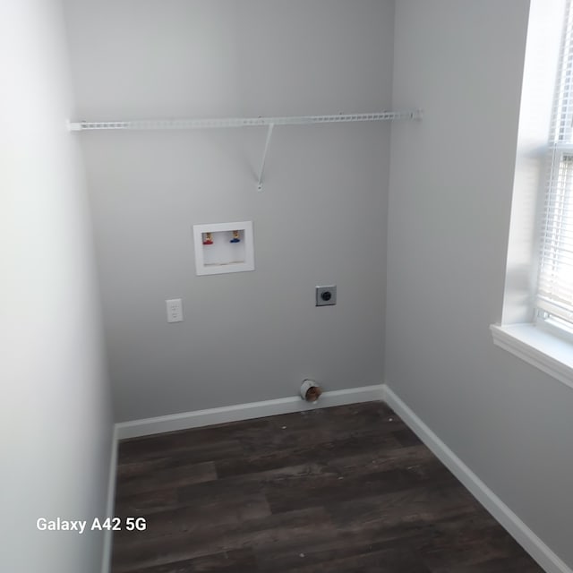 laundry room featuring laundry area, dark wood-type flooring, washer hookup, baseboards, and electric dryer hookup