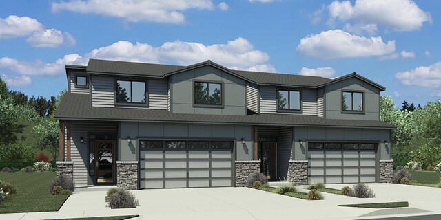 view of front of property with a garage