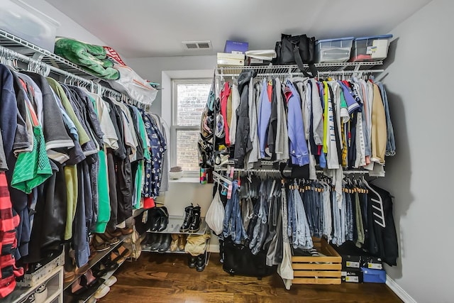 walk in closet featuring hardwood / wood-style floors