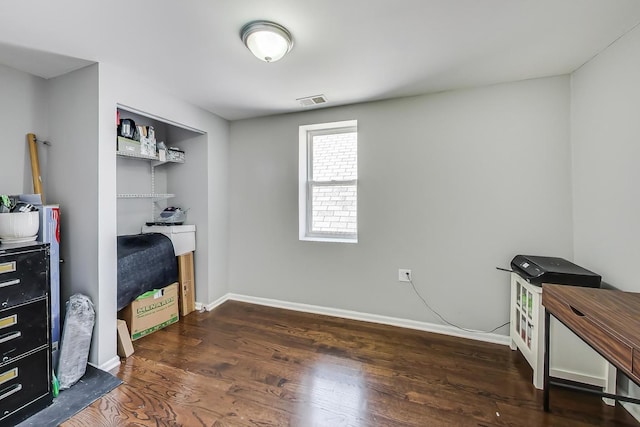 office area featuring dark wood-type flooring