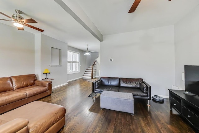 living room featuring ceiling fan and dark hardwood / wood-style flooring