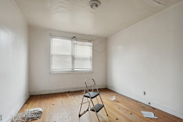 unfurnished room featuring wood-type flooring