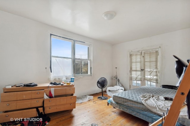 bedroom featuring hardwood / wood-style floors