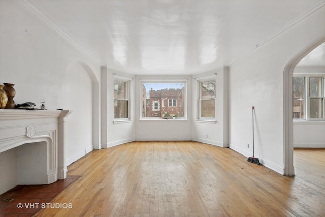 unfurnished living room featuring light wood-type flooring