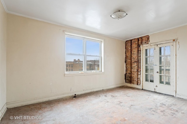 spare room with ornamental molding