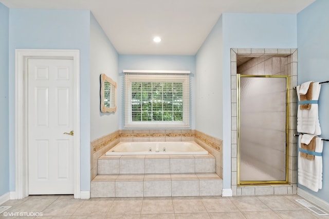 bathroom with plus walk in shower and tile patterned floors