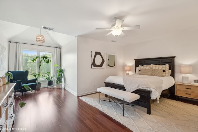 bedroom featuring hardwood / wood-style flooring and ceiling fan