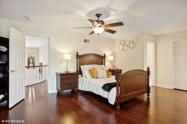 bedroom featuring dark wood-type flooring and ceiling fan