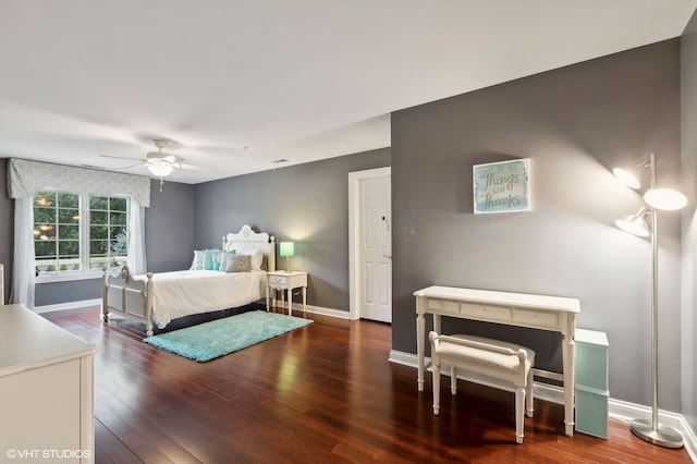 bedroom featuring ceiling fan and dark hardwood / wood-style flooring