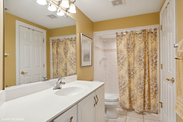 full bathroom featuring tile patterned flooring, vanity, toilet, and shower / bath combination with curtain