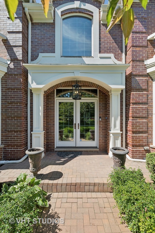 property entrance featuring french doors