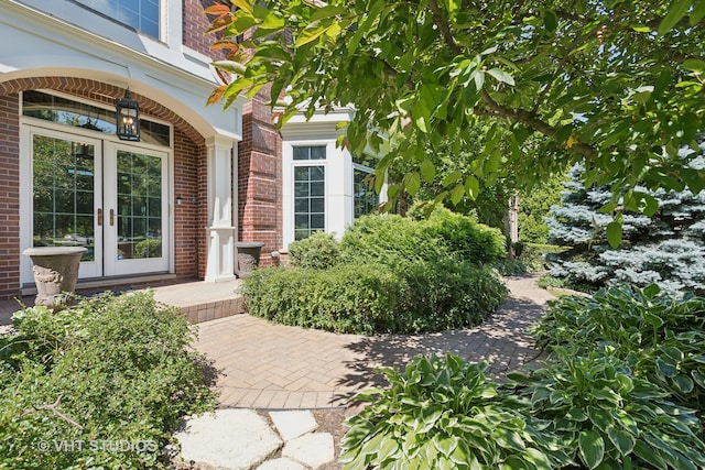 property entrance featuring french doors