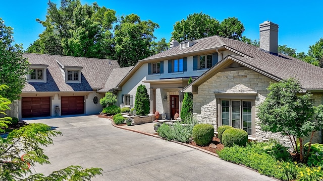 view of front of home with a garage