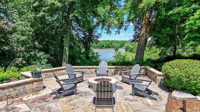 view of patio featuring an outdoor fire pit