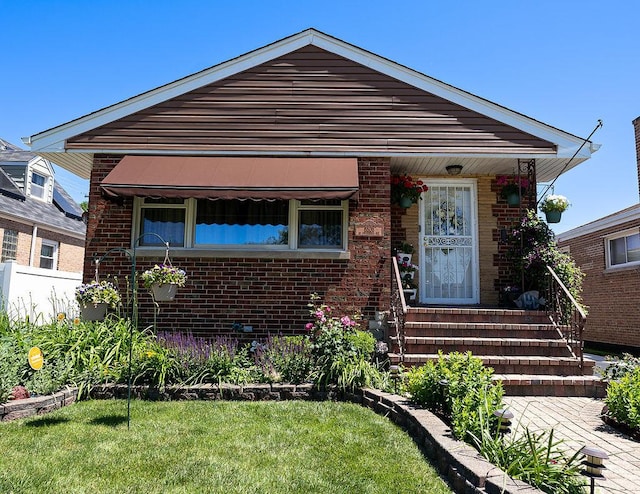 bungalow with a front lawn