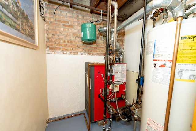 utility room featuring gas water heater