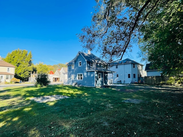 exterior space with a lawn