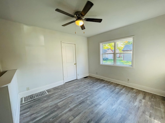 unfurnished room featuring ceiling fan and wood-type flooring