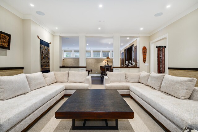 living room featuring crown molding