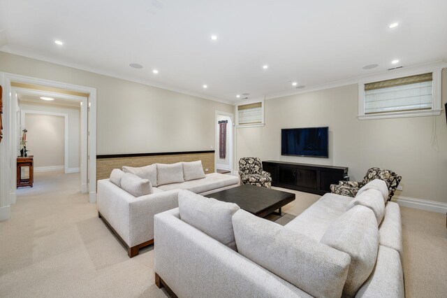 living room with ornamental molding and light carpet