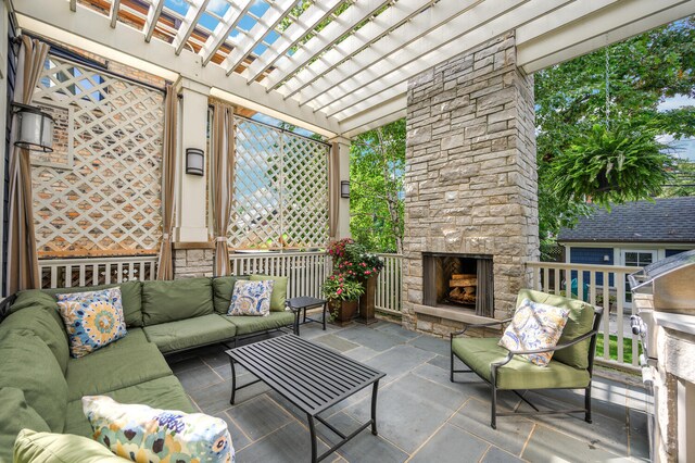 view of patio featuring a pergola and an outdoor living space with a fireplace