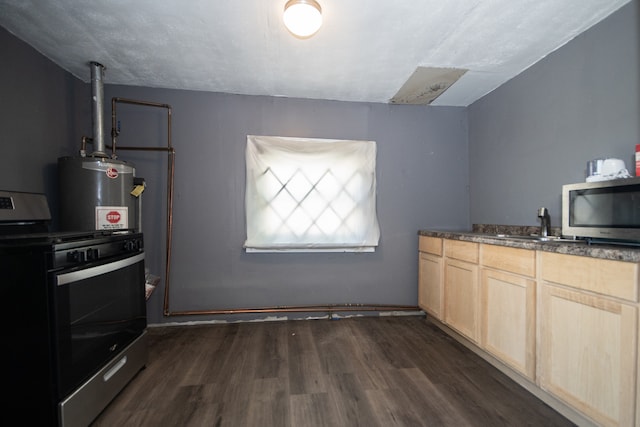 kitchen featuring light brown cabinets, dark hardwood / wood-style flooring, gas water heater, and stove