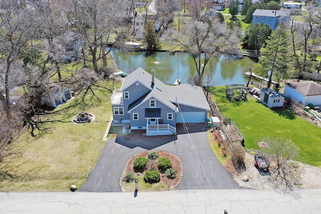 drone / aerial view with a water view