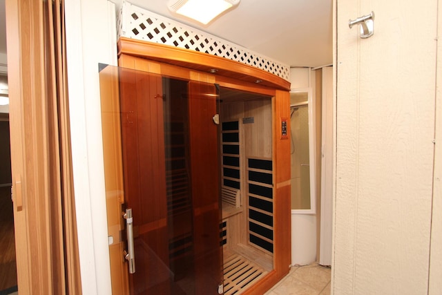 view of sauna featuring tile floors