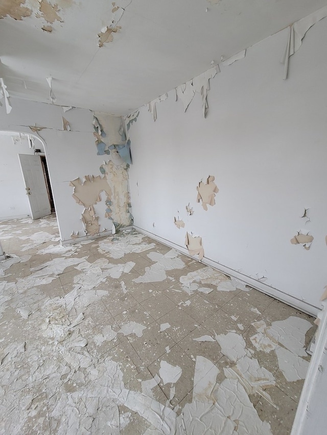 spare room featuring tile flooring