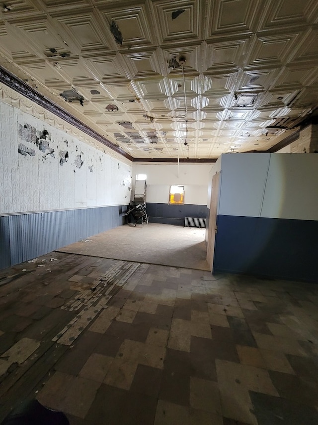 interior space featuring dark tile flooring