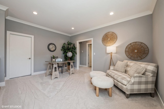 carpeted living room featuring ornamental molding