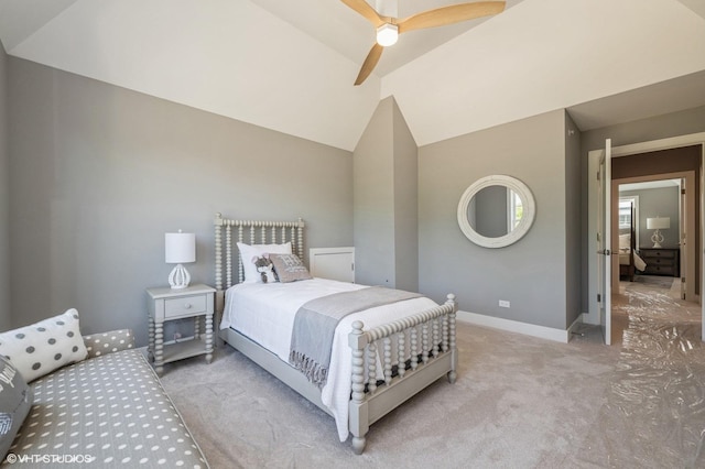 bedroom with ceiling fan, carpet, and lofted ceiling