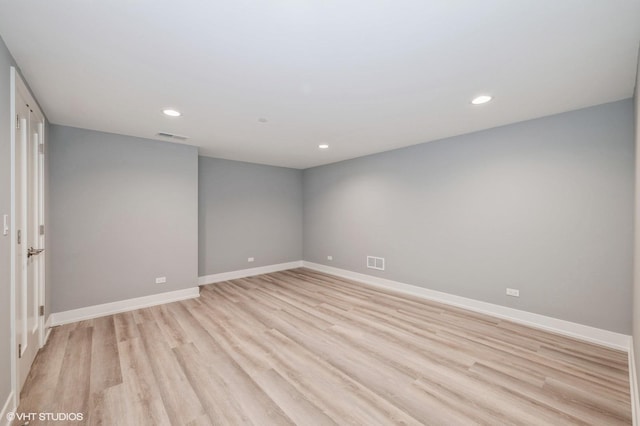 empty room featuring light hardwood / wood-style floors