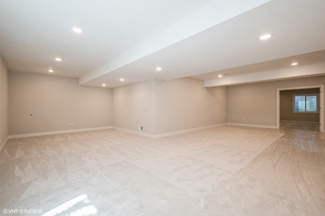 basement with carpet flooring