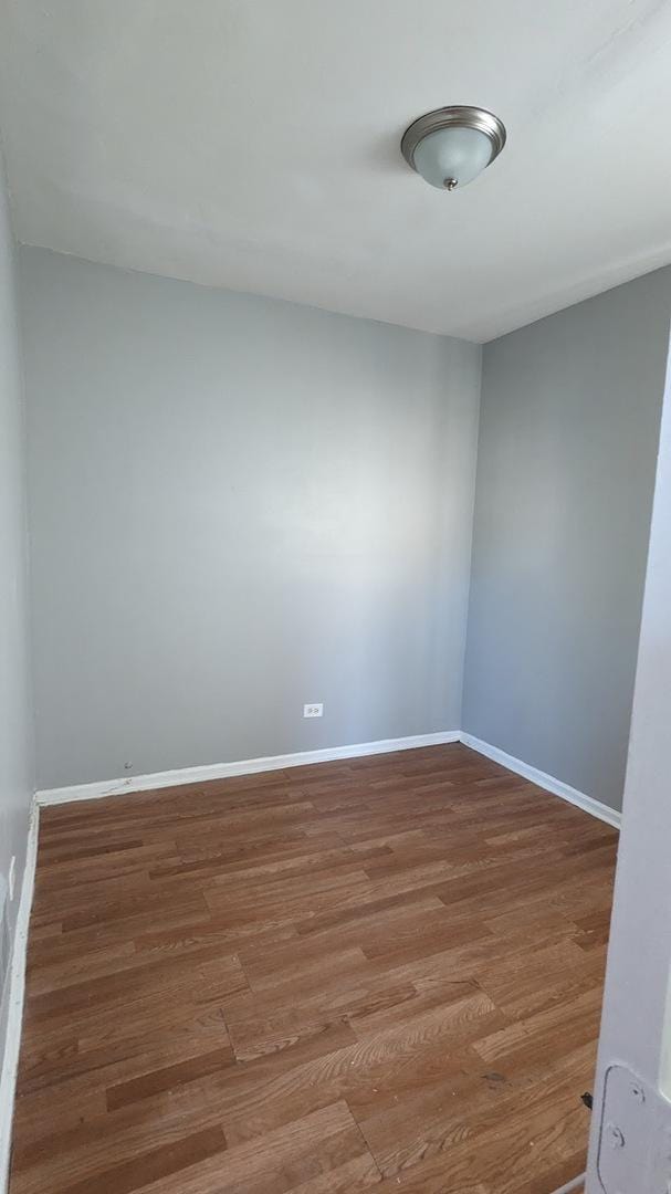 unfurnished room featuring wood-type flooring