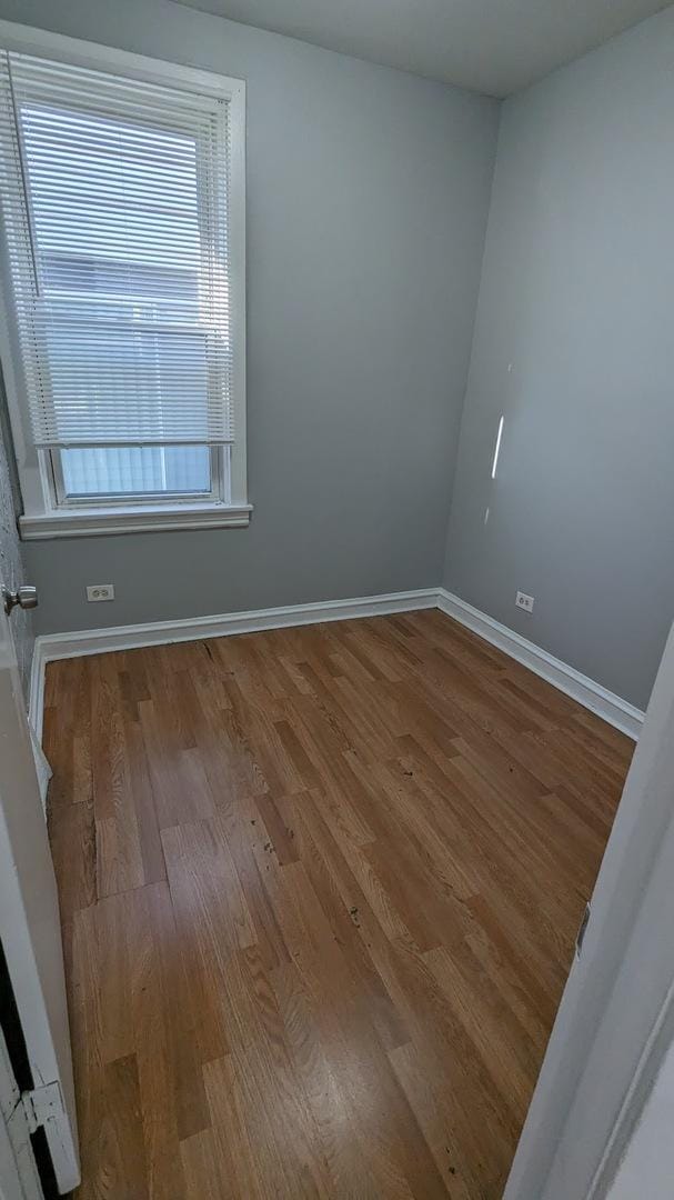 empty room featuring hardwood / wood-style floors