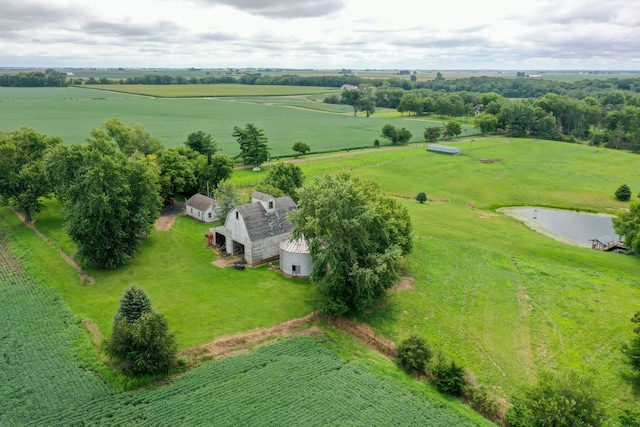 birds eye view of property with a rural view