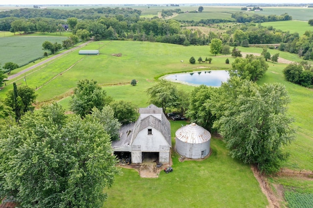 aerial view with a water view and a rural view