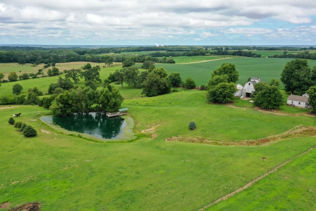 bird's eye view featuring a water view and a rural view