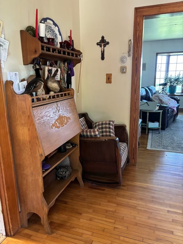 sitting room featuring hardwood / wood-style floors