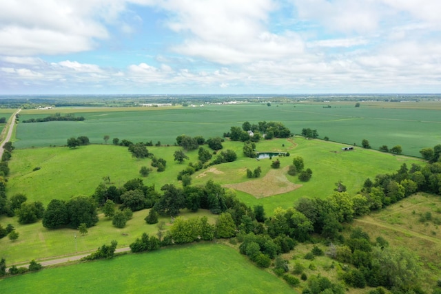 birds eye view of property featuring a rural view